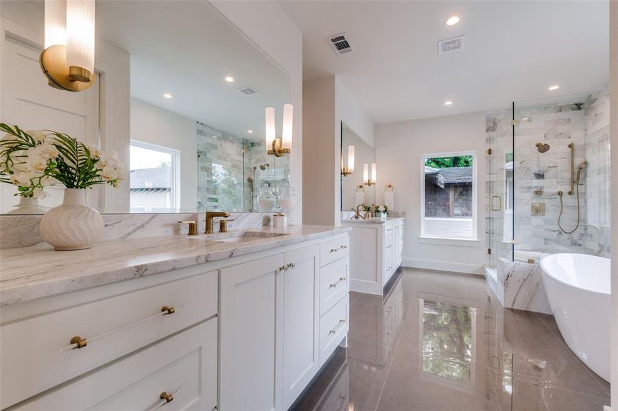Bathroom with a stall shower, tile patterned flooring, visible vents, and recessed lighting Bathroom with a stall shower, tile patterned flooring, visible vents, and recessed lighting