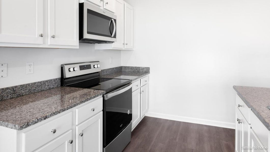 Furnished interior view inside a new home in Bella Point, Bolivia (Image 8).
