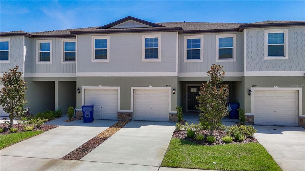 Front exterior of a new home in , San Antonio, FL, highlighting curb appeal (Image 2). Front exterior of a new home in , San Antonio, FL, highlighting curb appeal (Image 2).