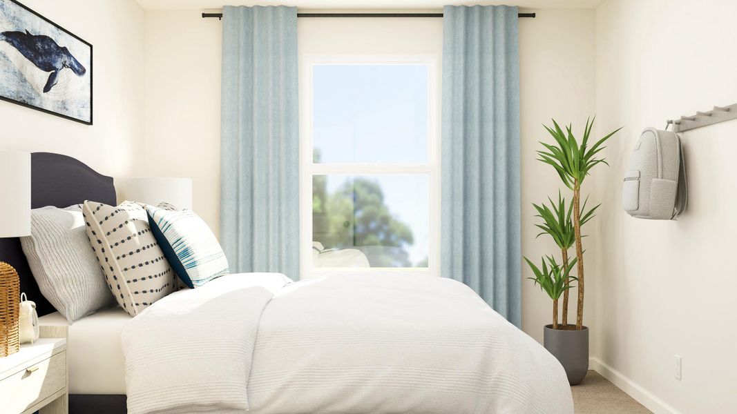 A couch with pillows and a plant. A couch with pillows and a plant.