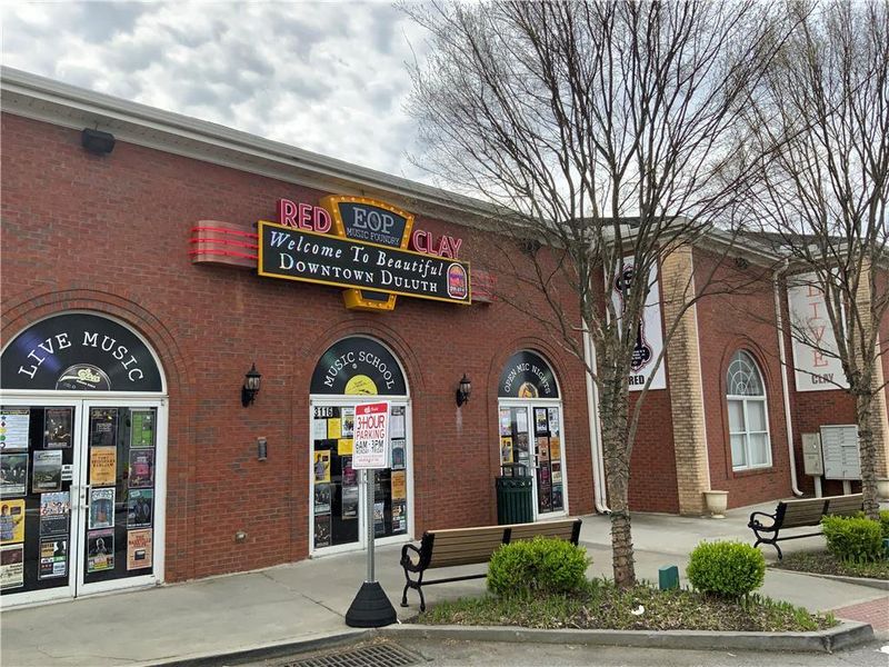 Front exterior of a new home in Evanshire Single Family, Duluth, GA, highlighting curb appeal (Image 2).