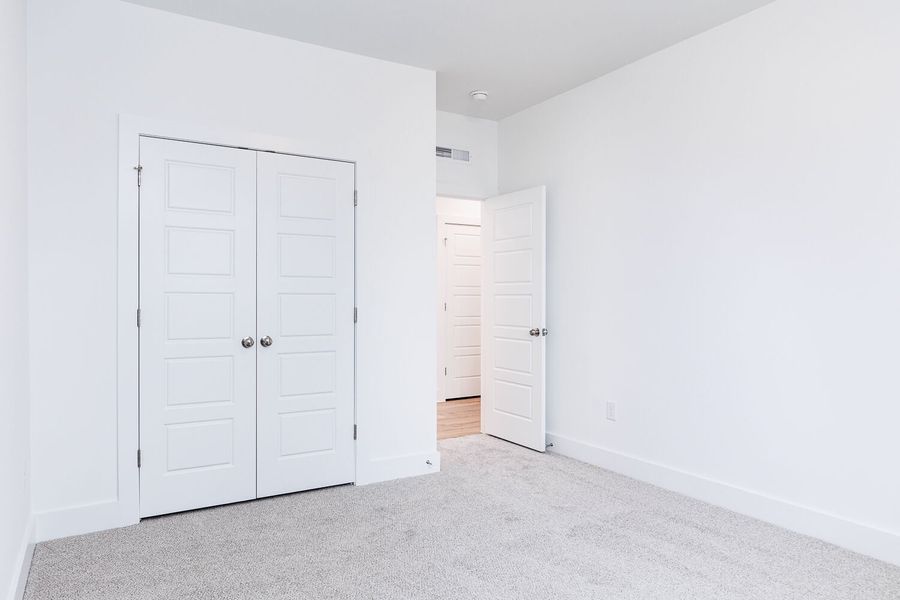 Spacious, unfurnished interior of a new home in High Grove Oaks, Fuquay Varina (Image 30).