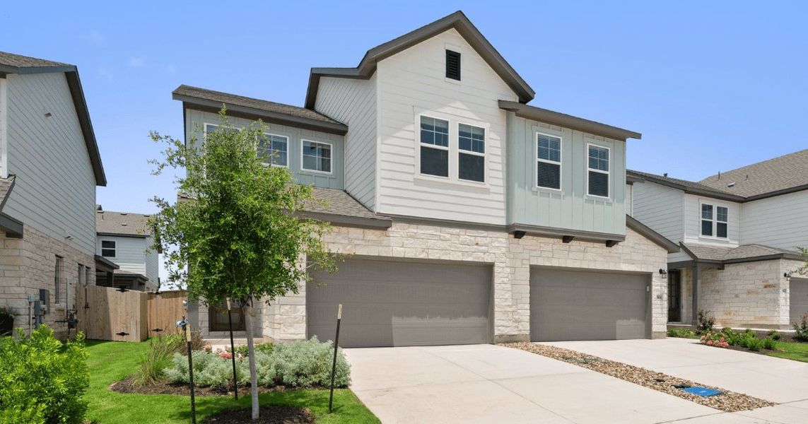 Front exterior of a new home in Park Central, Georgetown, TX, highlighting curb appeal (Image 1). Front exterior of a new home in Park Central, Georgetown, TX, highlighting curb appeal (Image 1).