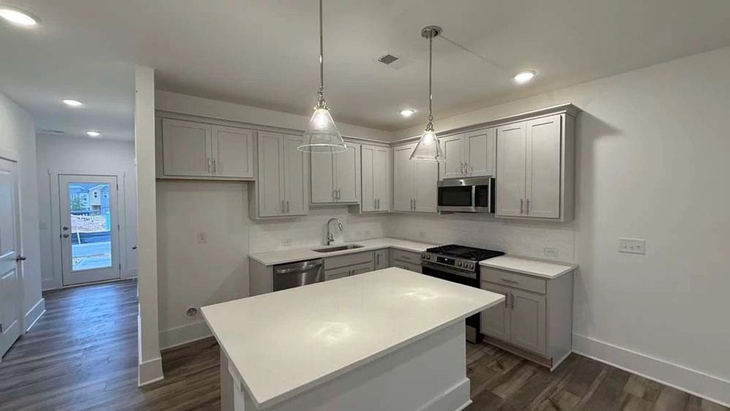 Kitchen featuring Milan Collection Finishes Construction Progress