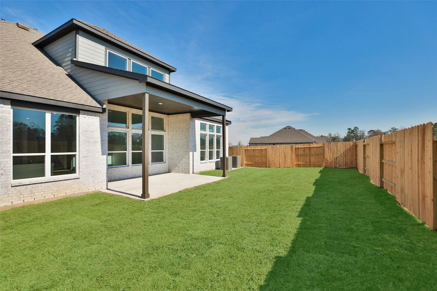 Exterior details and patio area of a home in Sundance Cove, Crosby (Image 2). Exterior details and patio area of a home in Sundance Cove, Crosby (Image 2).
