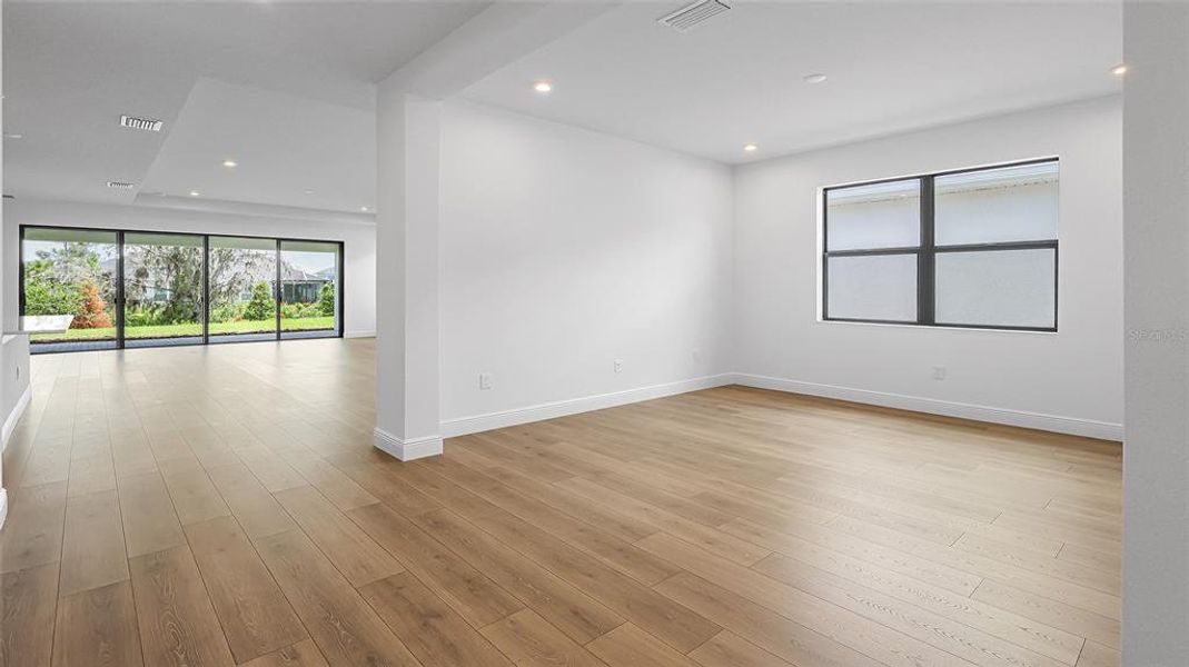 Spacious, unfurnished interior of a new home in Woodland Preserve, Parrish (Image 19).