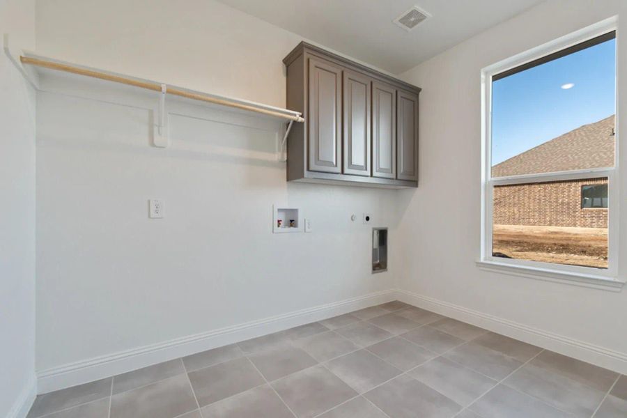 Laundry Room | Concept 2586 at Hidden Creek Estates in Van Alstyne, TX by Landsea Homes