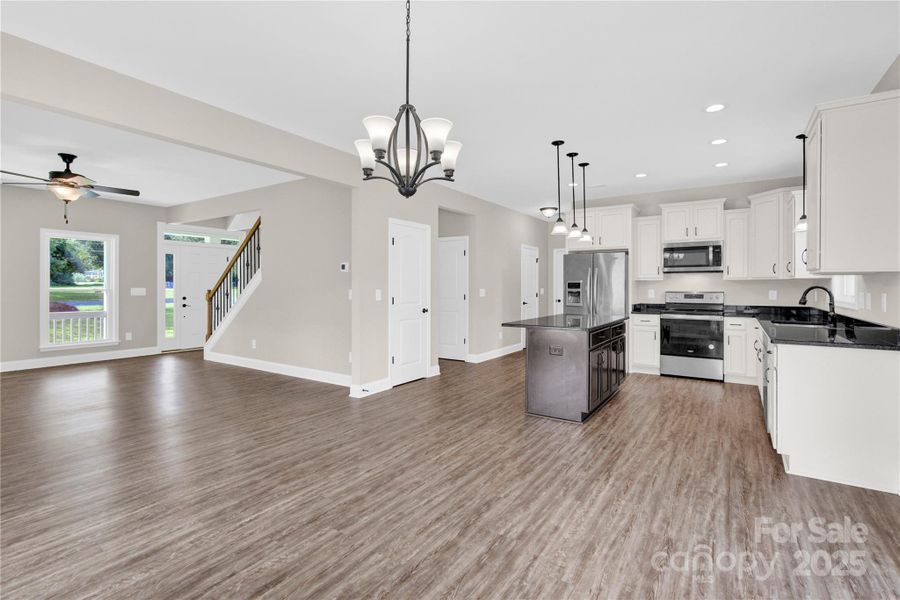 Breakfast area open to family room and kitchen.