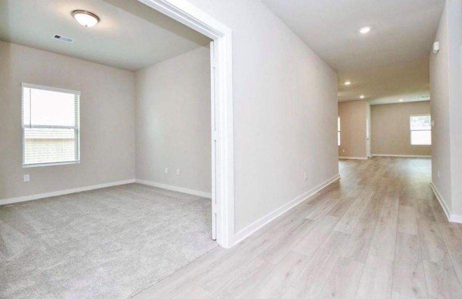 Spacious, unfurnished interior of a new home in Arabella on the Prairie, Richmond (Image 12).