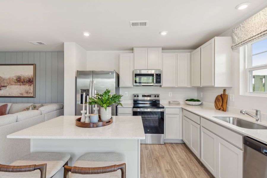 Representative furnished interior of a home built from the The Rutledge by Stanley Martin Homes in Essence at Trinity Townhomes, Columbia (Image 23).