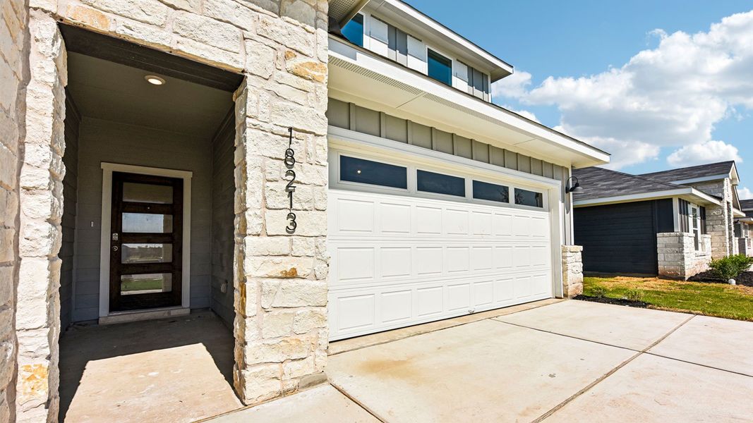 Exterior details and patio area of a home in Monarch Ranch, Manor (Image 3).