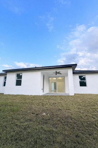 Exterior details and patio area of a home in , Lehigh Acres (Image 9).