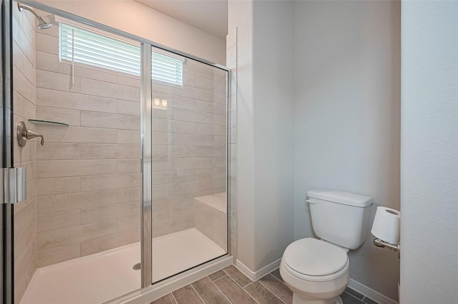 Furnished interior view inside a new home in Sunterra, Katy (Image 4).