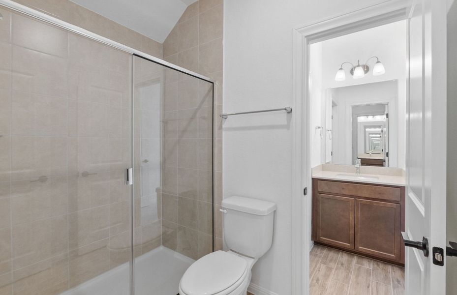 Furnished interior view inside a new home in Bluffview Reserve, Leander (Image 31).