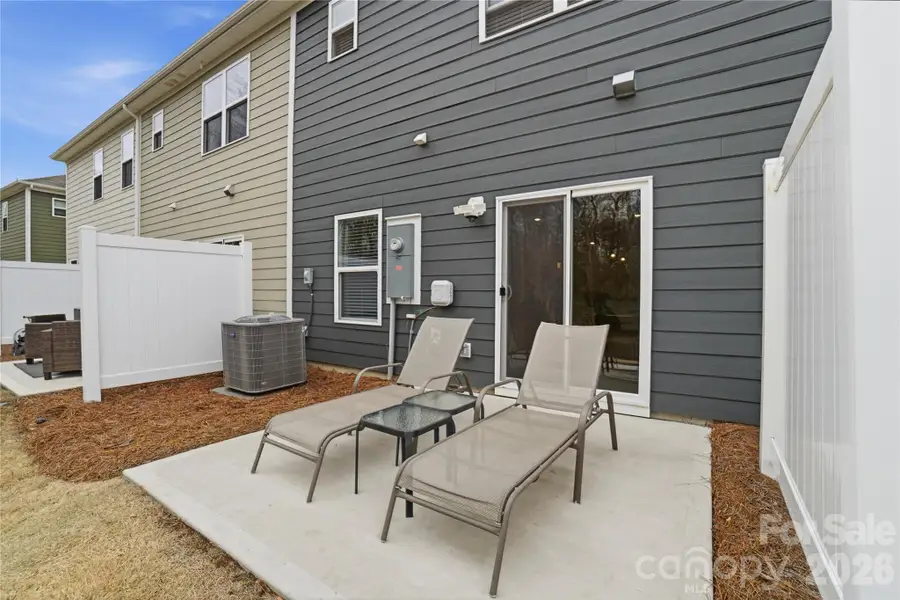 Exterior details and patio area of a home in , Monroe (Image 3).