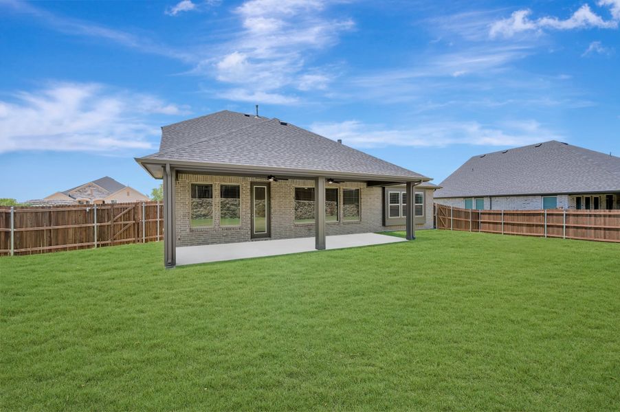 Exterior details and patio area of a home in View at the Reserve, Mansfield (Image 4).