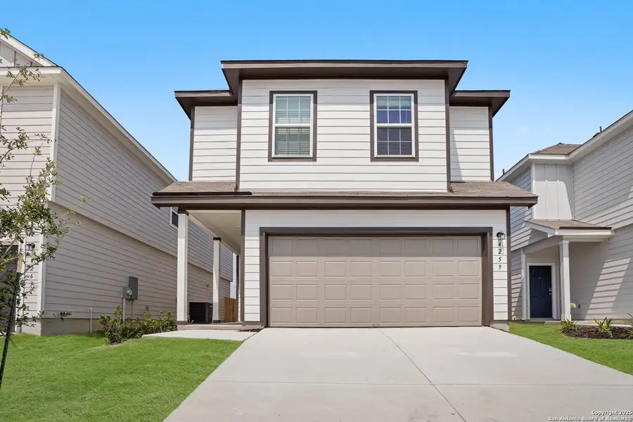 Front exterior of a new home in Melissa Ranch, San Antonio, TX, highlighting curb appeal (Image 2).