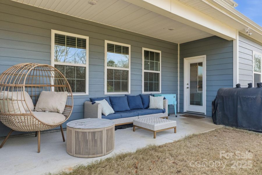 The back covered patio provides a tranquil spot to take in the views in your large back yard The back covered patio provides a tranquil spot to take in the views in your large back yard