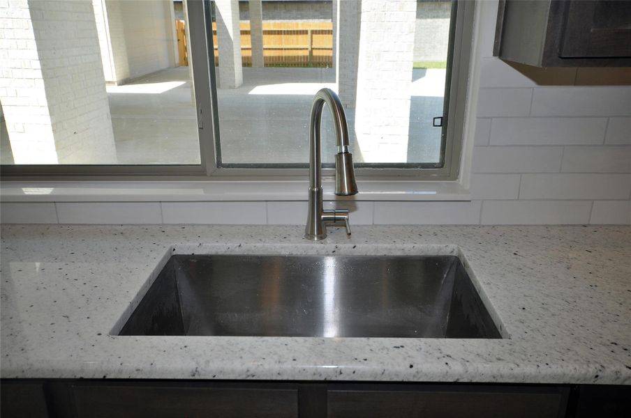 The single bowl SS sink is undercounted for ease of use.