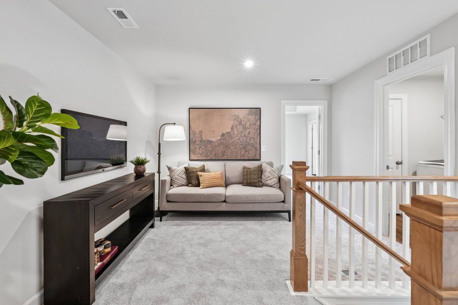 Representative furnished interior of a home built from the Eno by Tri Pointe Homes in Tredenham, Durham (Image 10).