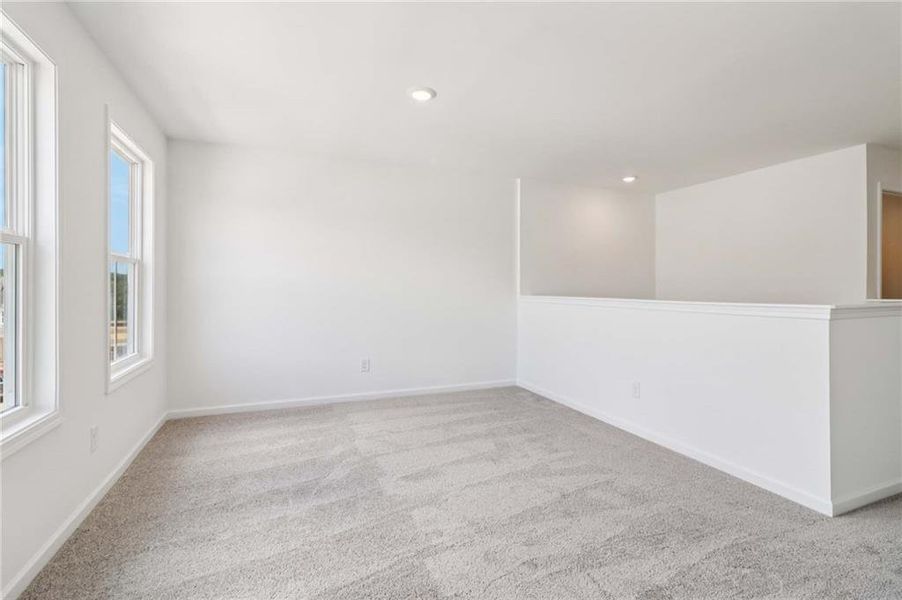 Spacious, unfurnished interior of a new home in Eastlyn Crossing, Flowery Branch (Image 26). Spacious, unfurnished interior of a new home in Eastlyn Crossing, Flowery Branch (Image 26).
