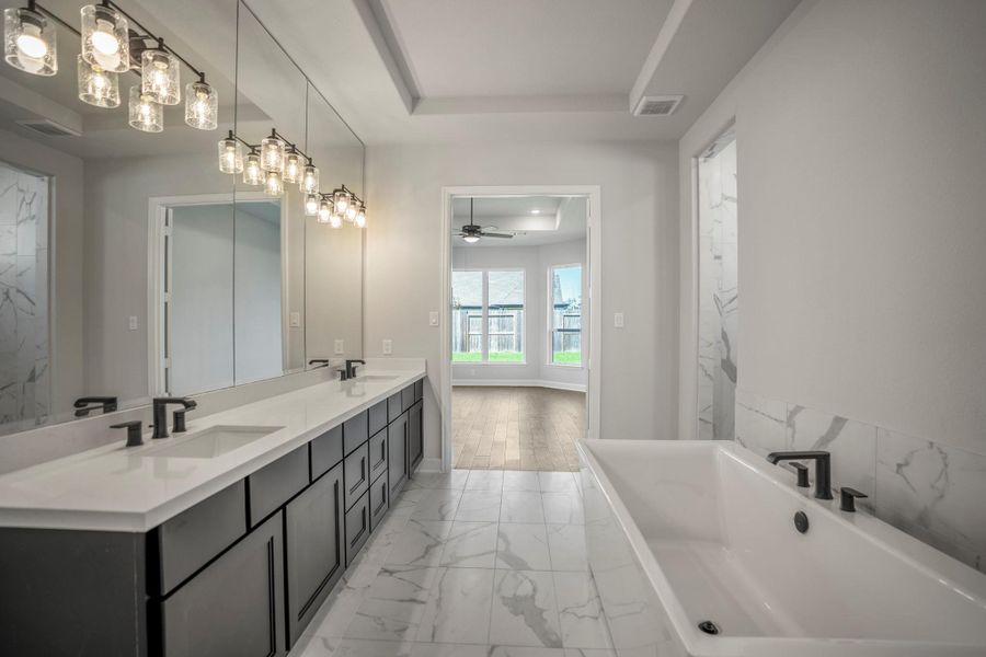 Furnished interior view inside a new home in Sienna 70′ Lots, Missouri City (Image 27).