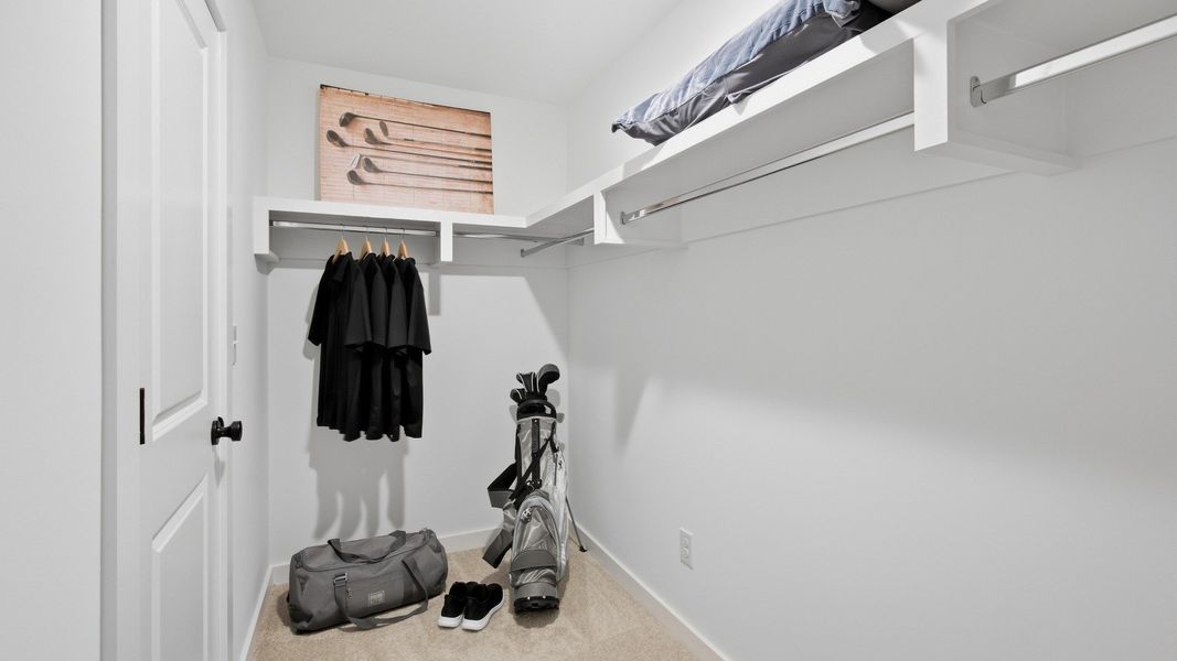 Walk-in closet with plenty of space for clothes and other items