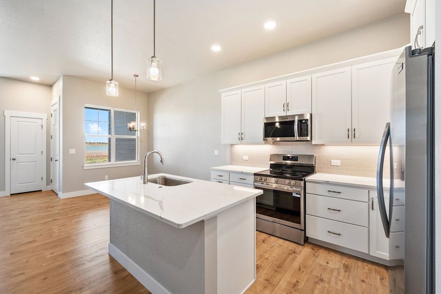 Furnished interior view inside a new home in The Lakes at Centerra, Loveland (Image 5).