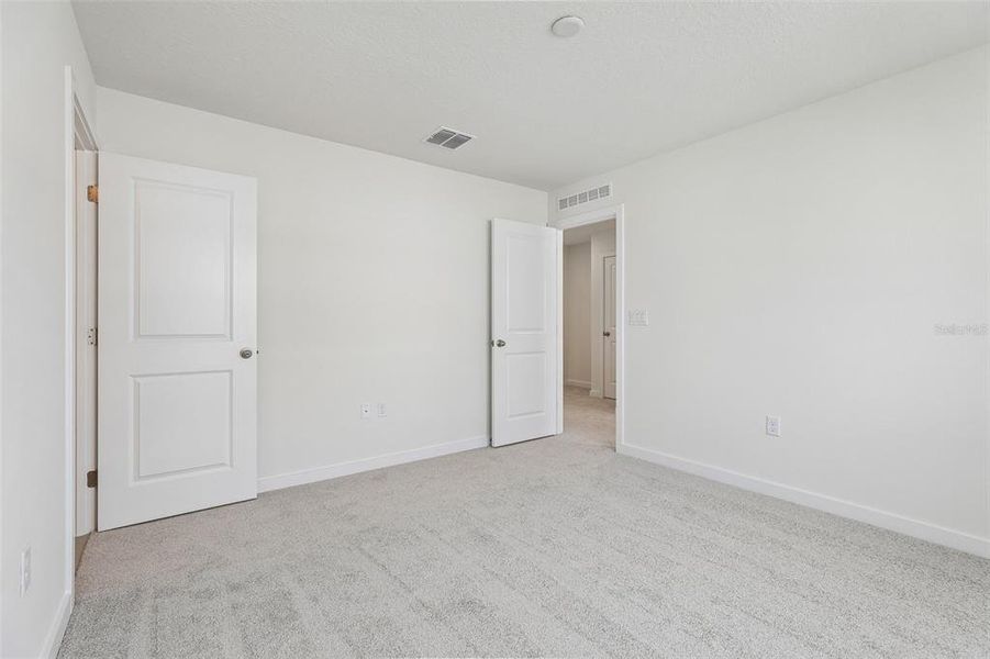 Spacious, unfurnished interior of a new home in Cyrene at Harmony, St. Cloud (Image 18). Spacious, unfurnished interior of a new home in Cyrene at Harmony, St. Cloud (Image 18).