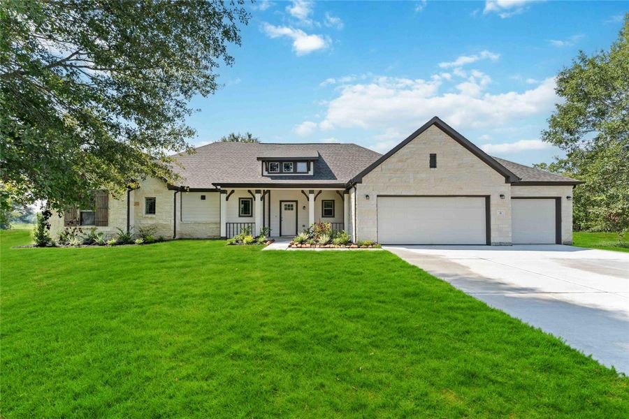 Front exterior of a new home in Barton Place, Cleveland, TX, highlighting curb appeal (Image 17). Front exterior of a new home in Barton Place, Cleveland, TX, highlighting curb appeal (Image 17).
