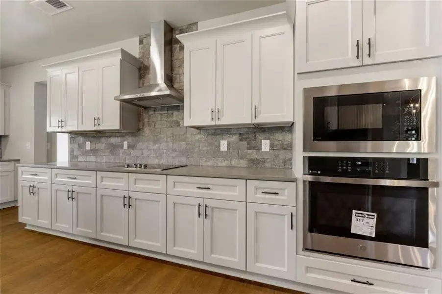 Furnished interior view inside a new home in SteepleChase, Hoschton (Image 6).