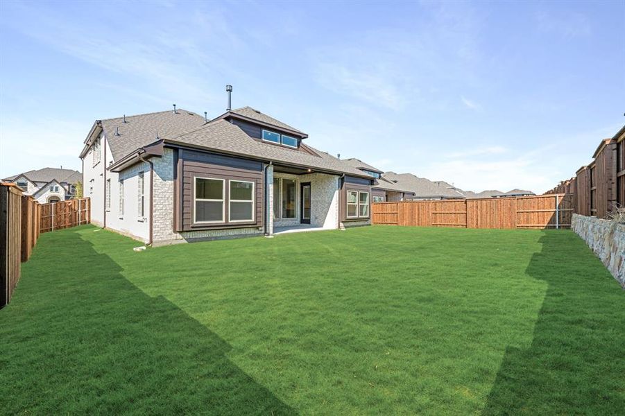 Exterior details and patio area of a home in Windsong Ranch Classic 61, Prosper (Image 3). Exterior details and patio area of a home in Windsong Ranch Classic 61, Prosper (Image 3).