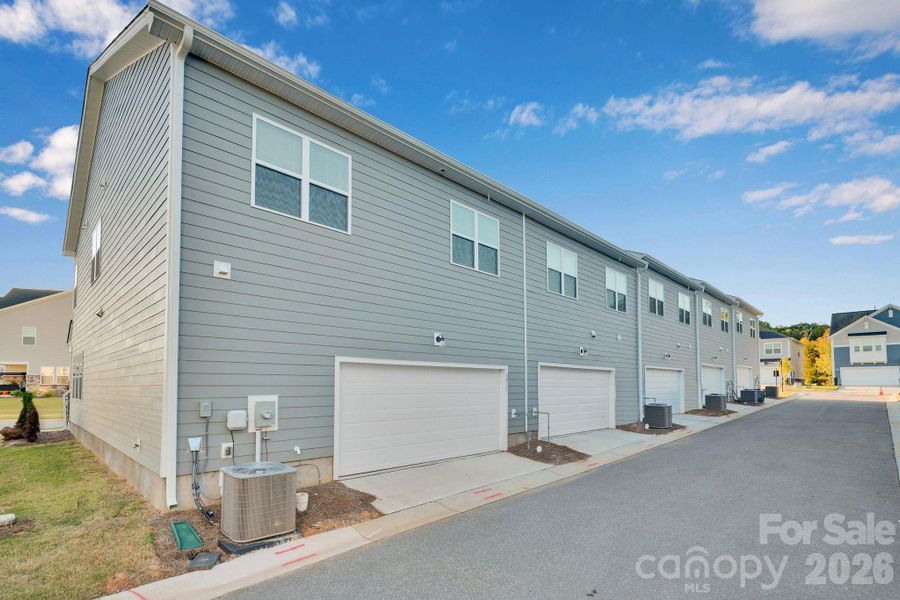 Exterior details and patio area of a home in Trellis at The Commons, Charlotte (Image 3). Exterior details and patio area of a home in Trellis at The Commons, Charlotte (Image 3).
