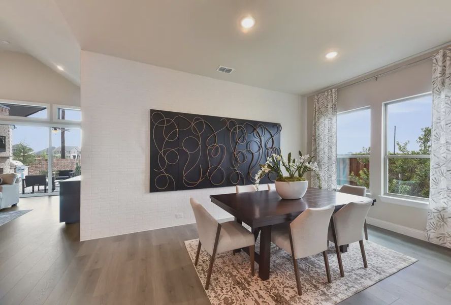 Representative furnished interior of a home built from the Waylon by Chesmar Homes in 6 Creeks, Kyle (Image 7).