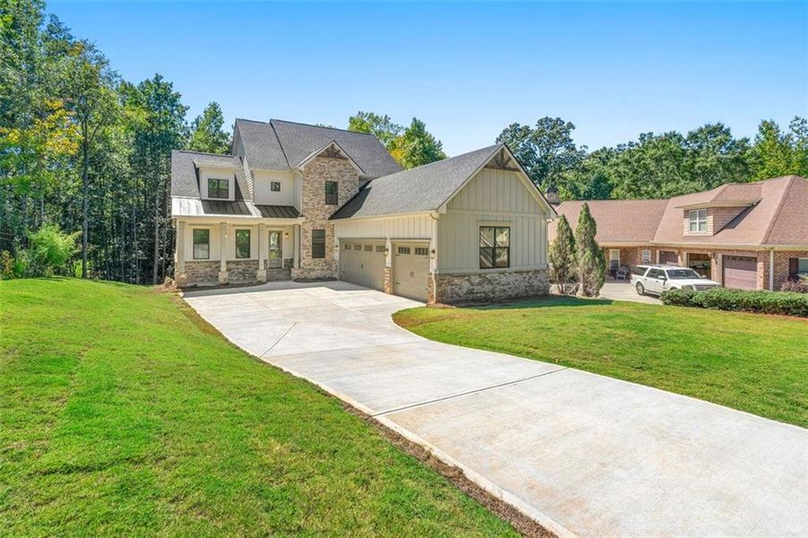 Front exterior of a new home in , Jefferson, GA, highlighting curb appeal (Image 2).