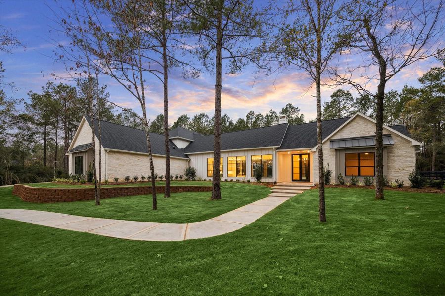 Front exterior of a new home in , Montgomery, TX, highlighting curb appeal (Image 24).