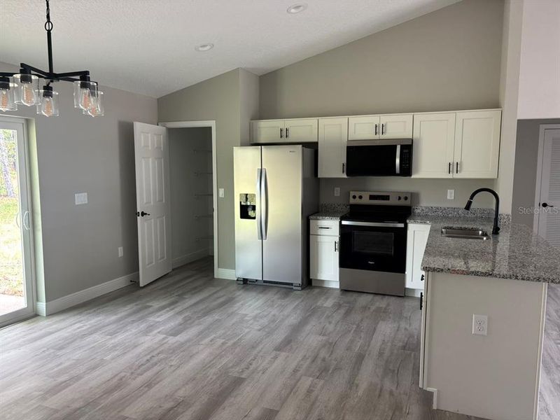 Furnished interior view inside a new home in , Dunnellon (Image 7).