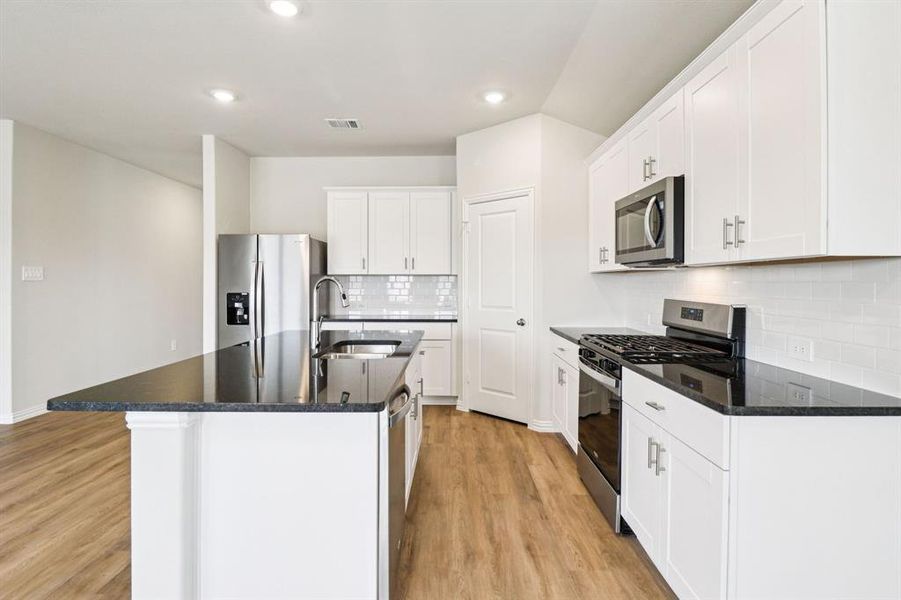 Furnished interior view inside a new home in Trails of Lavon - Signature Series, Lavon (Image 10). Furnished interior view inside a new home in Trails of Lavon - Signature Series, Lavon (Image 10).