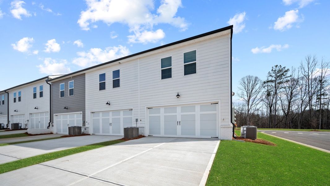 Front exterior of a new home in Echo Glen, Stockbridge, GA, highlighting curb appeal (Image 18).