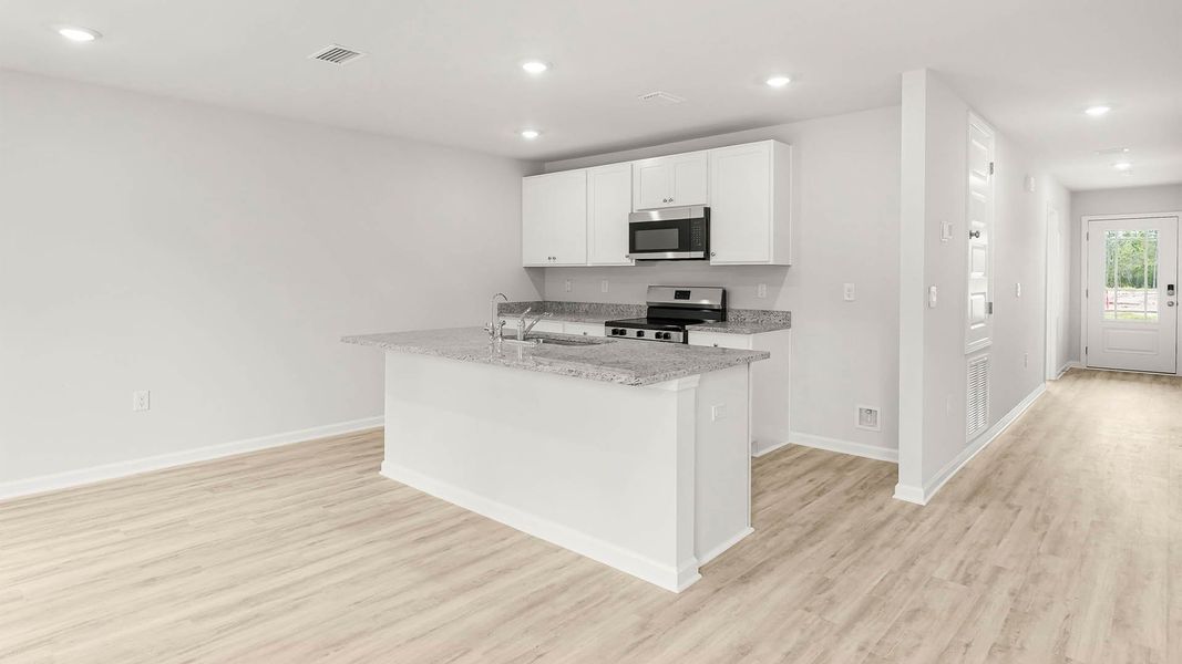 Furnished interior view inside a new home in Palmetto Bluff, Port Saint Joe (Image 11). Furnished interior view inside a new home in Palmetto Bluff, Port Saint Joe (Image 11).