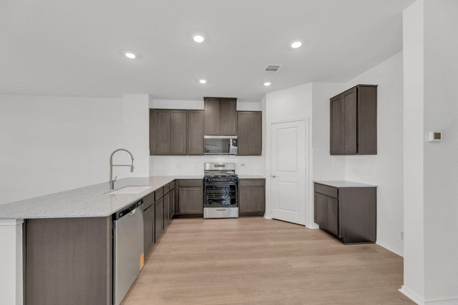 Furnished interior view inside a new home in Salerno - Heritage Collection, Round Rock (Image 9).