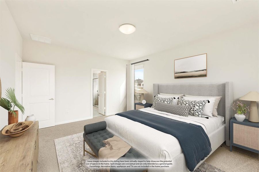 Bedroom with upholstered bed, carpet flooring, and doorway leading to ensuite bathroom Bedroom with upholstered bed, carpet flooring, and doorway leading to ensuite bathroom