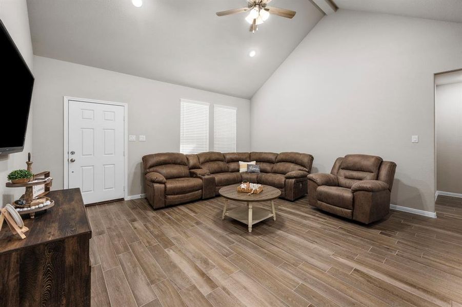 The spacious great room provides the perfect place for your family to spend time together! High ceilings. Large windows allow natural light to stream into this beautiful space.