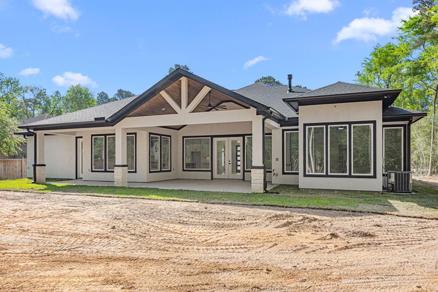 Exterior details and patio area of a home in , Magnolia (Image 4).