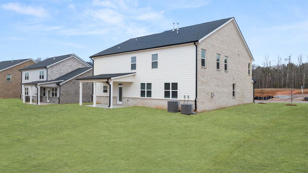 Exterior details and patio area of a home in The Gates at Pates Creek, Hampton (Image 25).