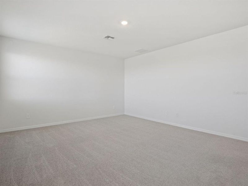 Spacious, unfurnished interior of a new home in Coasterra - Reserve Series, Palmetto (Image 32).