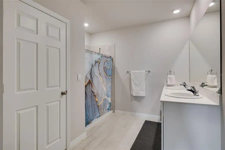 Furnished interior view inside a new home in Coral Bay - Express & Tradition, North Fort Myers (Image 11).