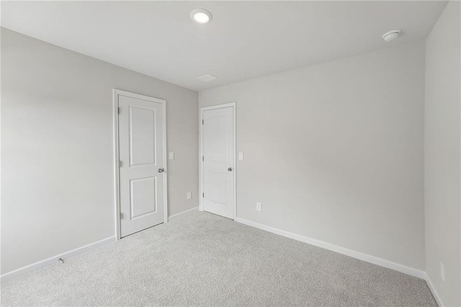 Spacious, unfurnished interior of a new home in Northwoods at Mirror Lake, Villa Rica (Image 34).