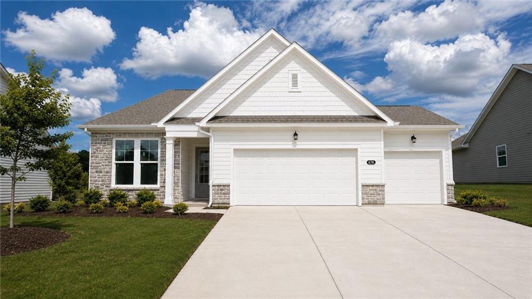 Front exterior of a new home in Wehunt Meadows, Hoschton, GA, highlighting curb appeal (Image 1). Front exterior of a new home in Wehunt Meadows, Hoschton, GA, highlighting curb appeal (Image 1).