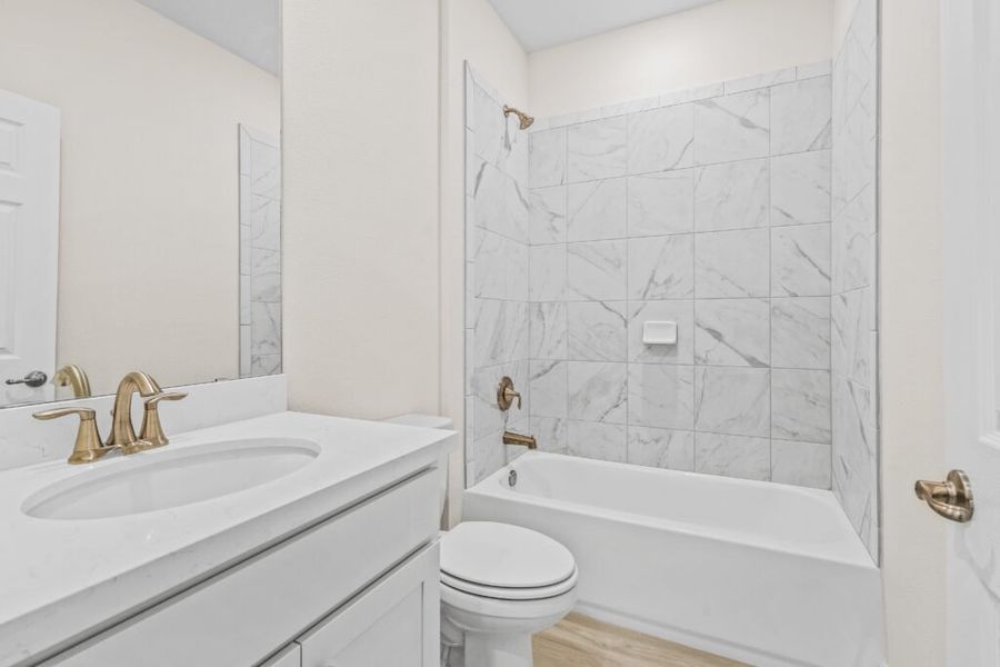 Furnished interior view inside a new home in Windswept Estates, Freeport (Image 9).